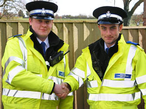 Danny Smith handing over to PCSO John Midgley